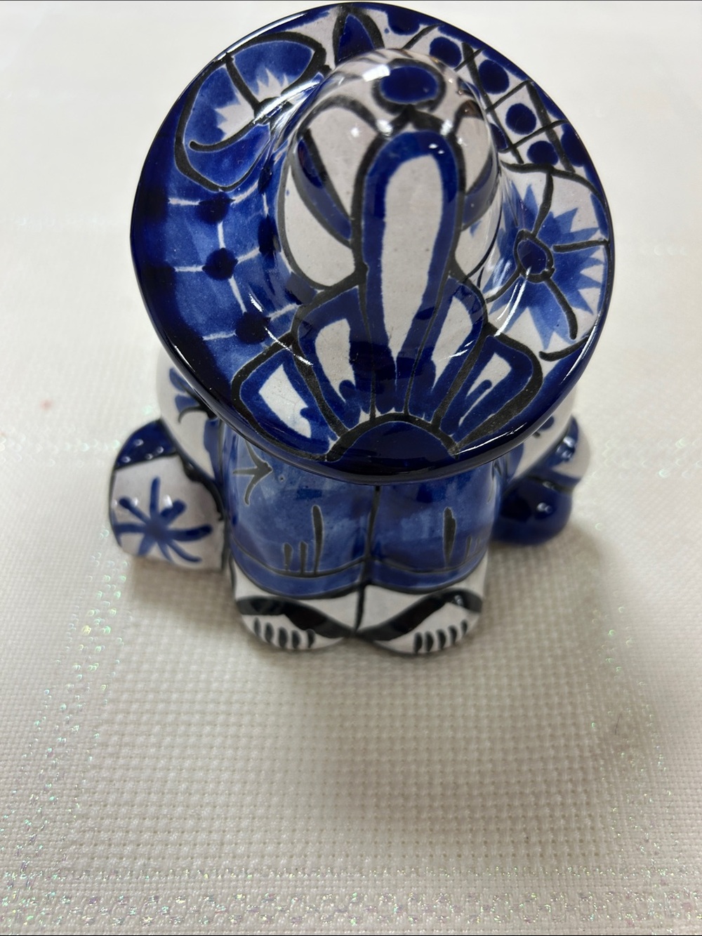 Handcrafted cobalt blue and white Talavera ceramic sleeping/siesta man